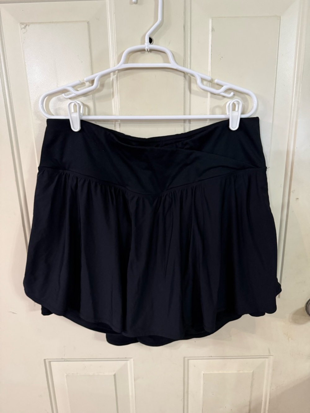 Torrid Black Active Skort with Subtle Waistband Detail and pockets.